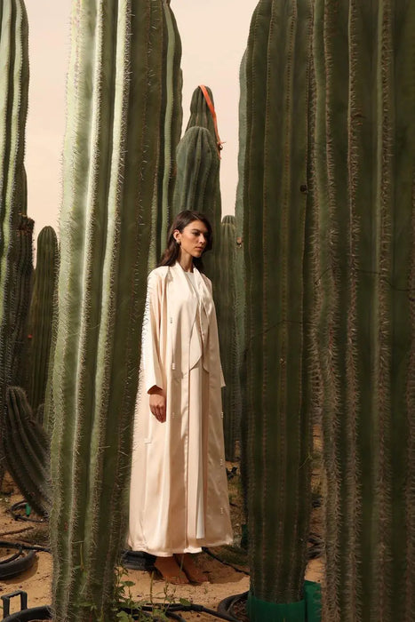 Glossy Milky Tone Abaya with Pearl Embellishments